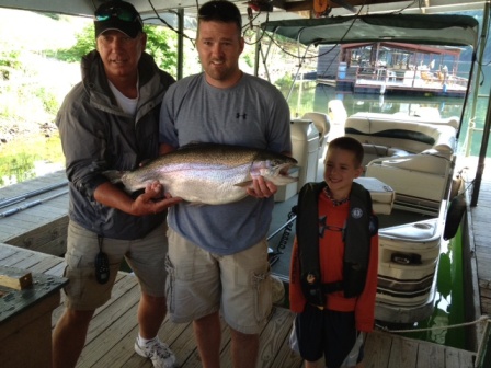 Aaron McDonald And Son Brayton McDonald with Thier Trophy 17.5 Lb Rainbow Trout Caught While Fishing With Bill Beck Out Of Lilleys Landing
